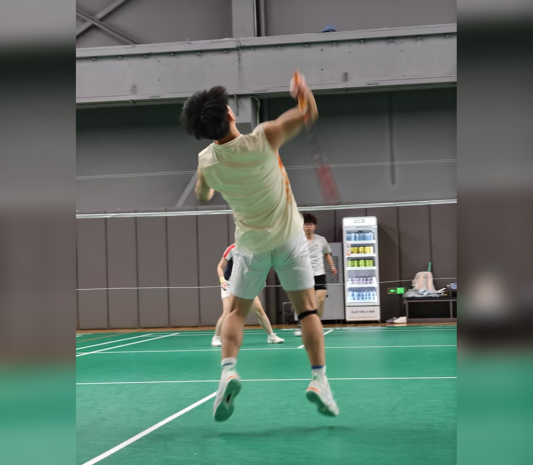 Zhenguo Wang playing badminton